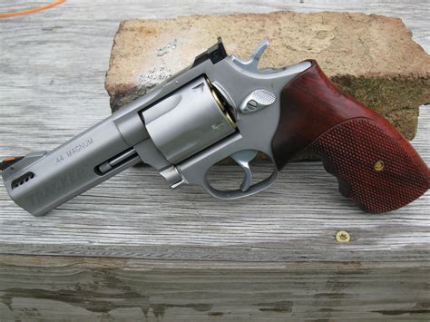 Taurus 2650041HWD1 65 357 4" FS Wood MTBLK Revolver. . Taurus 627 wood grip